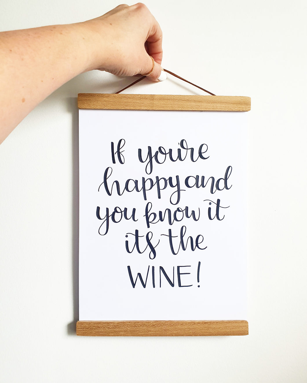 Hand lettered WINE quote